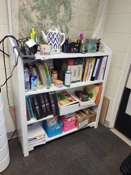 White bookcase items on and around bookcase, not included image