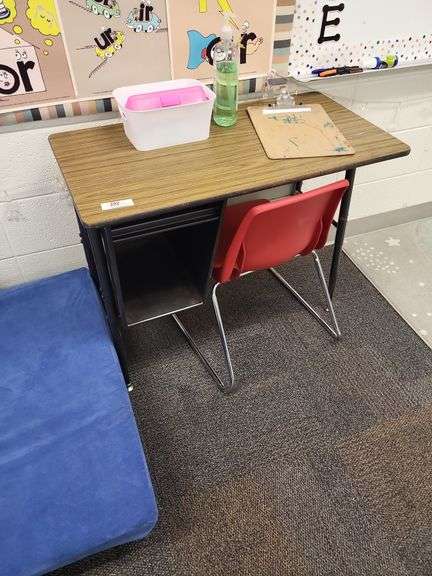 School desk with one red chair items on desk not included image