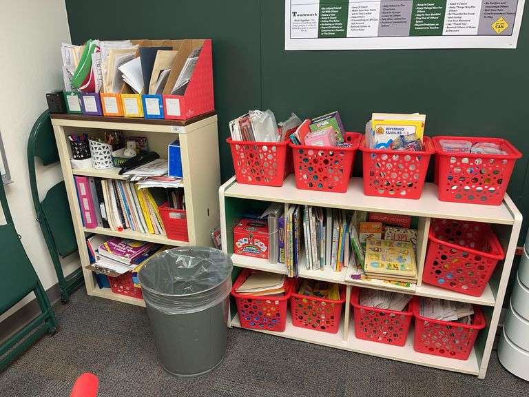 Book cases and trash can image