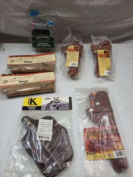 Gun holster lot, Uncle mike's rifle slingers image