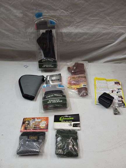 Uncle mike's sidekick hip holsters, hunter leather belt holster, bulldog pistol case, gun lock. Pistol gun socks image