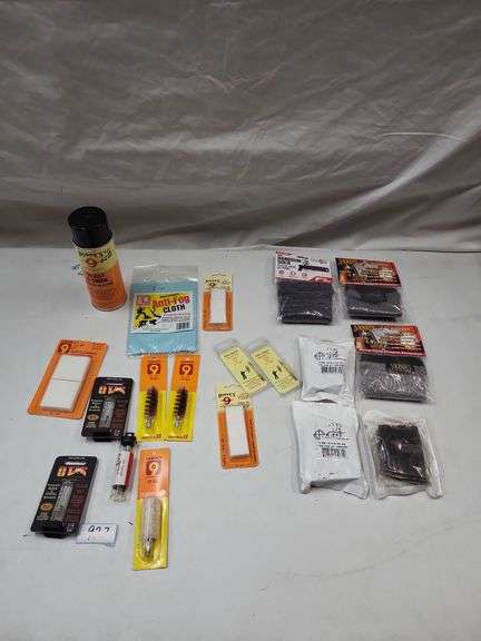 3 five round .223/5.56 SS magazines,  handgun socks, gun cleaning lot image