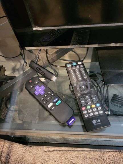 LG tv on stand w/Soundbar & roku stick bulletin boards, white board