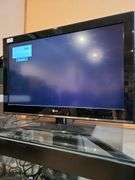 LG tv on stand w/Soundbar & roku stick bulletin boards, white board