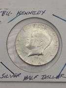 Two 1964 Kennedy Half Dollars BU