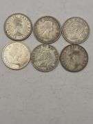 Six Silver Canadian Quarters