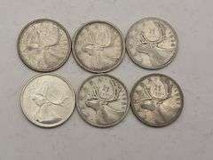 Six Silver Canadian Quarters