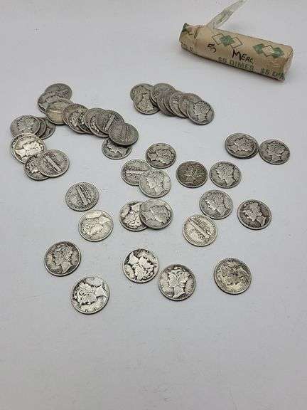 50 mercury dimes different dates. image