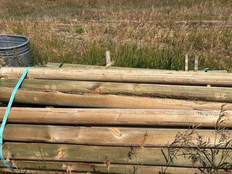 Bundle of wooden fence posts