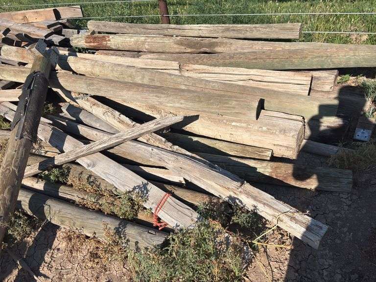 Misc. Pile Of lumber, Posts And Rail Road Ties image