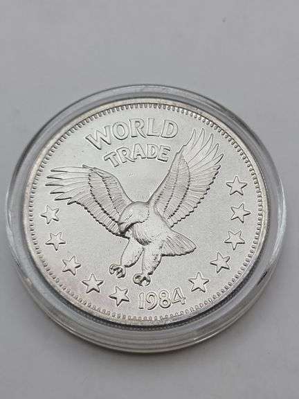 1984 World Trade Unit one troy ounce .999 silver round image