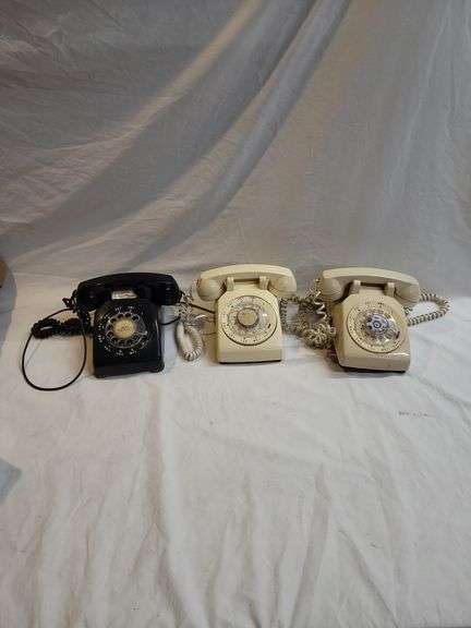 3 vintage rotary telephones image
