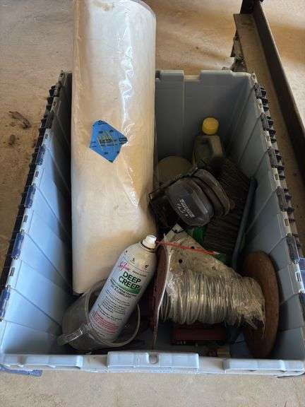 Tote of weed spray, tools and others