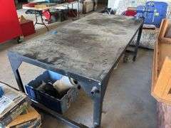 Approx 6’x3’ metal work bench on casters. 3” vice