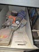 Contents on Top Side of Shelf Taps & Dies, Chisels, Drill Bits, Small Motors Etc