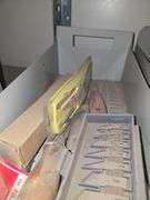 Contents on Top Side of Shelf Taps & Dies, Chisels, Drill Bits, Small Motors Etc