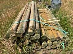 Bundle of wooden fence posts