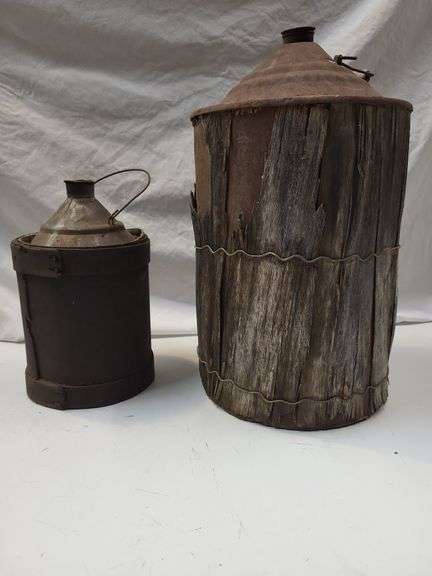Vintage metal cans wrapped in wood image