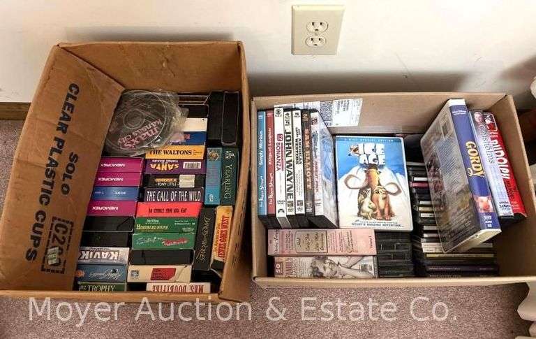 Group of VHS and DVDs image