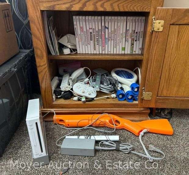 Wii Console, 5 Remotes, 2 Nunchucks, 3 Controllers, 23 Games and Accessories image