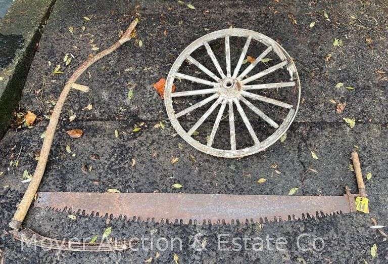Scythe, Wagon Wheel, and 2 Man Cross-cut Saw image