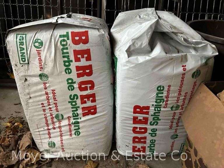 (2) Bags of Peat Moss and (5) Bags of Mulch image