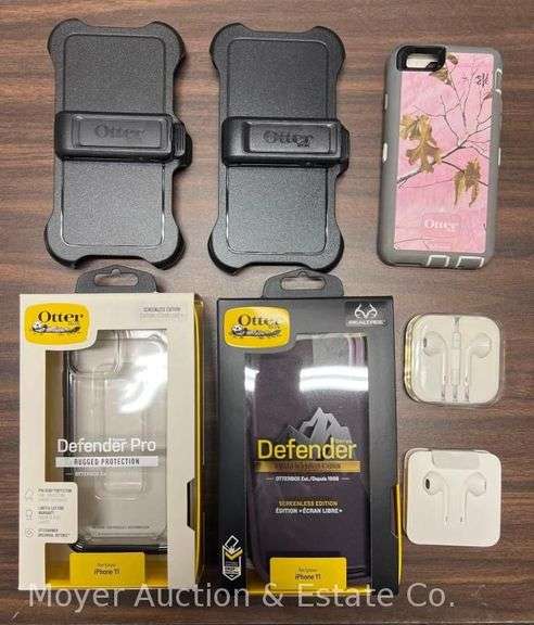 Group of OtterBox Iphone Cases with 2 New Pairs of Apple Earbuds image