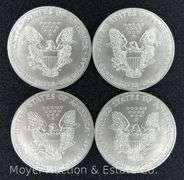 (4) 2002 American Eagle Silver Dollars