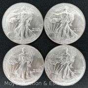 (4) 2000 American Eagle Silver Dollars