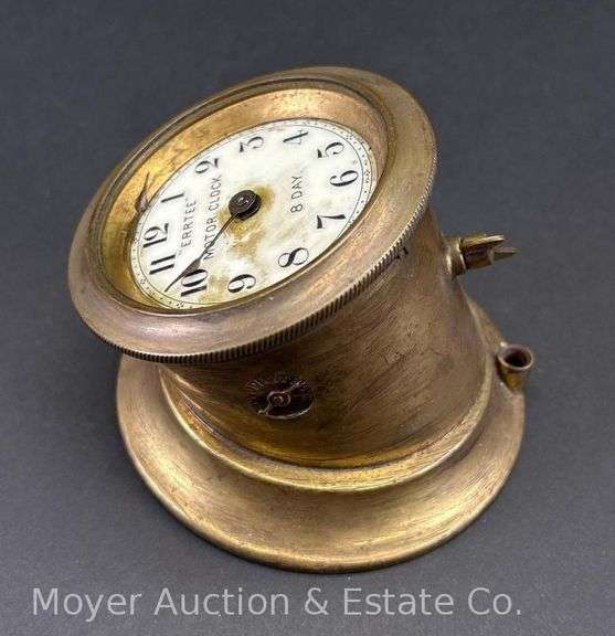 "Errtee" 8 Day Motor Clock, Missing Glass and Broken Hand, 4.25"w image