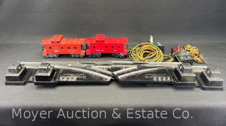 (2) Lionel O Guage Cabooses, and (4) S Gauge Switches image