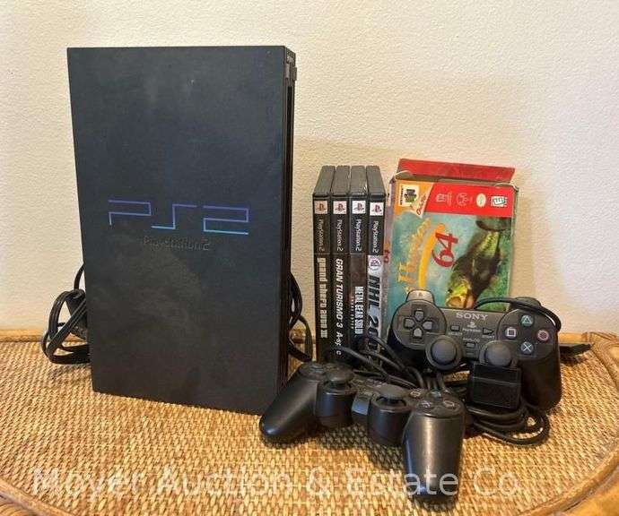 PS2 with 2 Controllers and 4 Games image