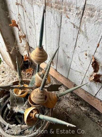 Group of Lightening Rods off Barn Roof, Connected to Cable