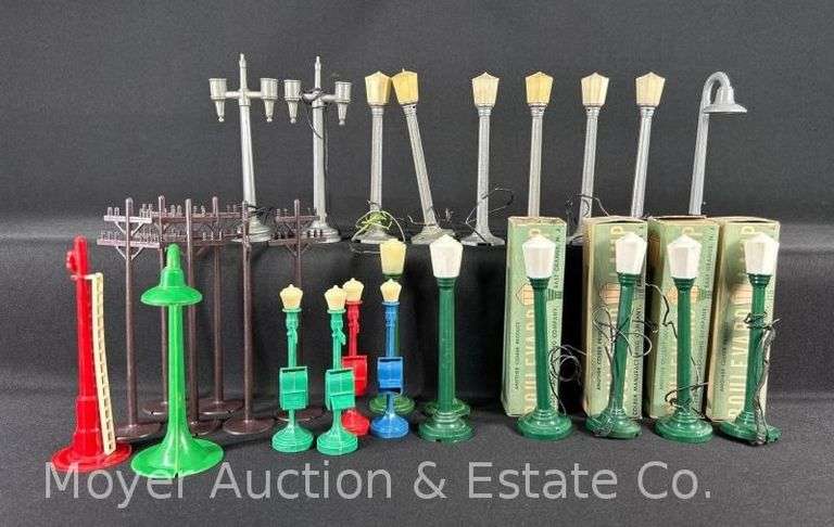 Group of Lamp Posts and Telephone Poles, Some Lionel image