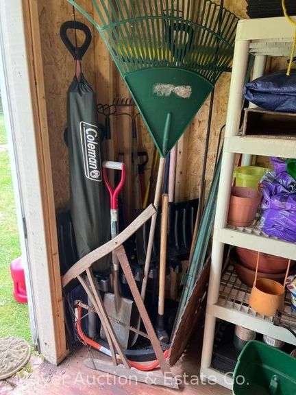 Group of Long Handled Tools, Buck Saw, Large Saw Blade, Etc. image