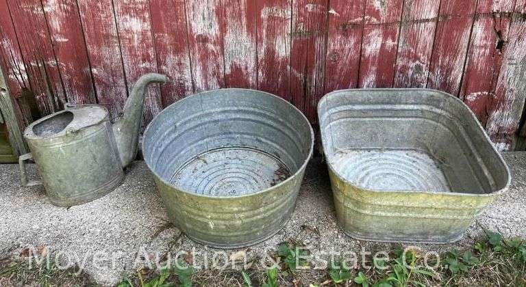 Two Galvanized Wash Basin with Watering Can image