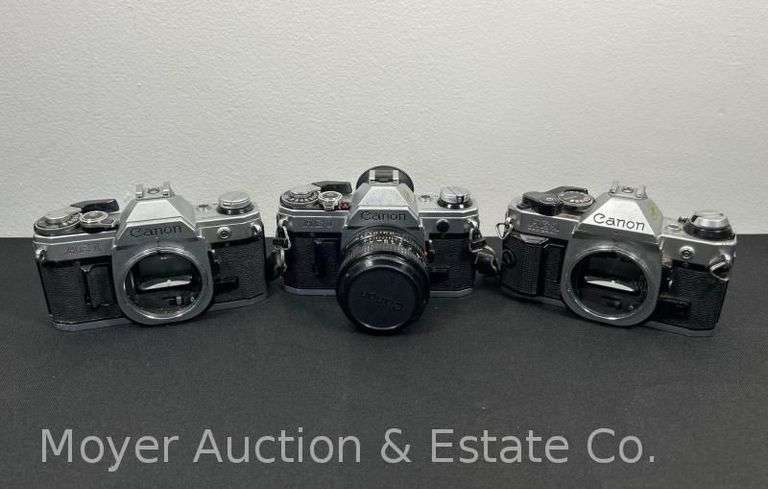 (3) Canon Film Cameras, 1 with Lens, AE-1 and AE-1 Program image