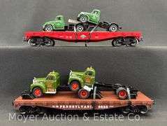 (2) Lionel Flatcars with Mack Trucks, No. 17534 and 17518, with Original Boxes