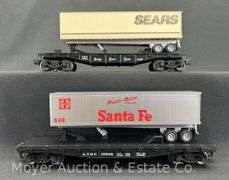 (2) Lionel Flatcars with Trailers, No. 17502 and 19411, with Original Boxes