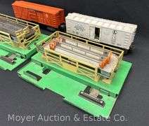 Lionel No. 3472 Operating Milk Car and No. 3656 Operating Cattle Car