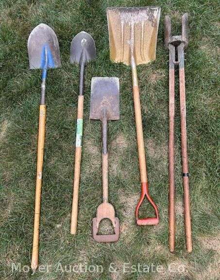 Group of Shovels and Post Hole Digger image