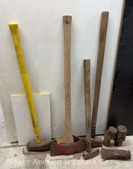 Group of Splitting Mauls, Axe, and Rusty Sledge Hammer Heads image