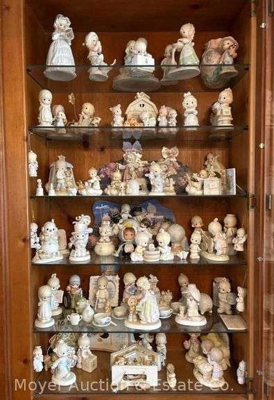 Group of 70 Asst. Precious Moment Figurines and Cuckoo Clock image