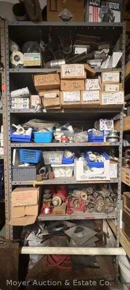 Contents of Garage Shelf, Plumbing Parts, PVC, Vents, P Traps, Etc. image