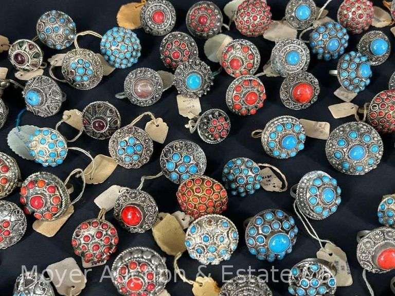 Group of 75 Rings with Blue & Red Stones, made in India, appear to be new/old stock image