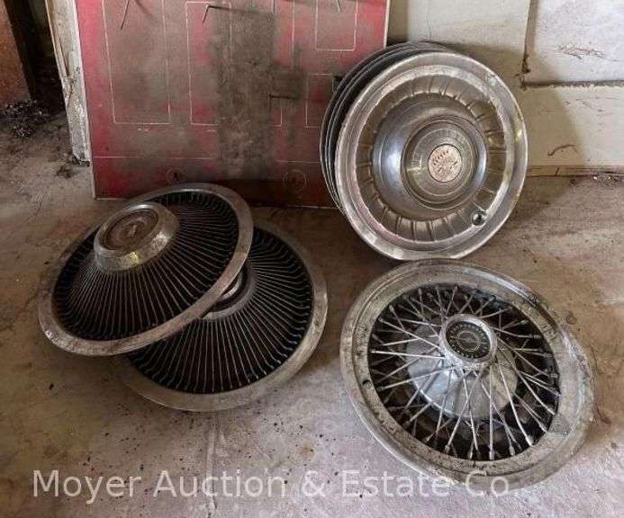 Group of Asst. Vintage Hub Caps and Blackhawk Hand Tools Wall Rack image