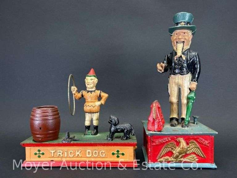 (2) Reproduction Cast Iron Coin Banks, Uncle Sam and Trick Dog, 7"-11.5"h image