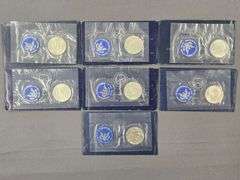 (7) Eisenhower Uncirculated Silver Dollars - (5) 1971’s, 1973, 1974