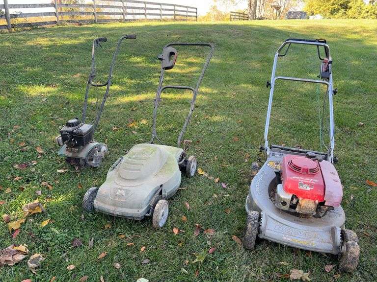 Pair of Push Mowers and Small Tiller image