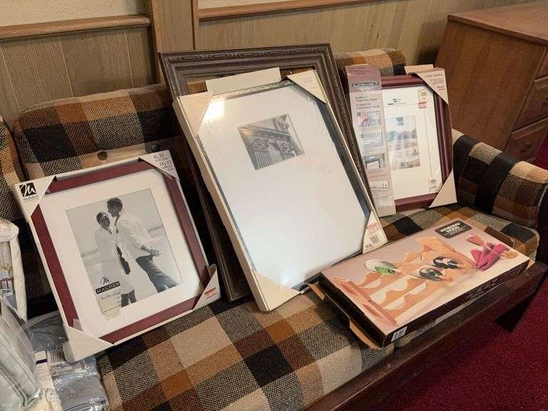 Assorted Picture Frames and Wine Bottle Holder image